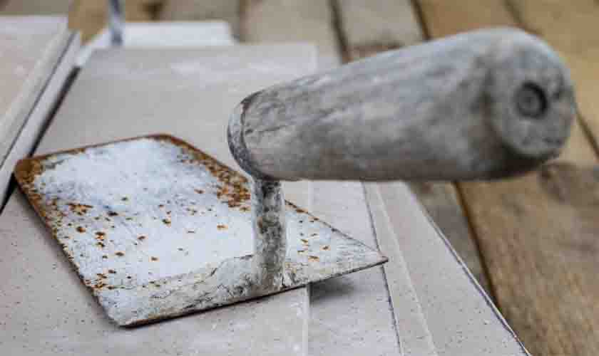 Auxiliar de construção civil não receberá adicional de insalubridade por manuseio de cimento