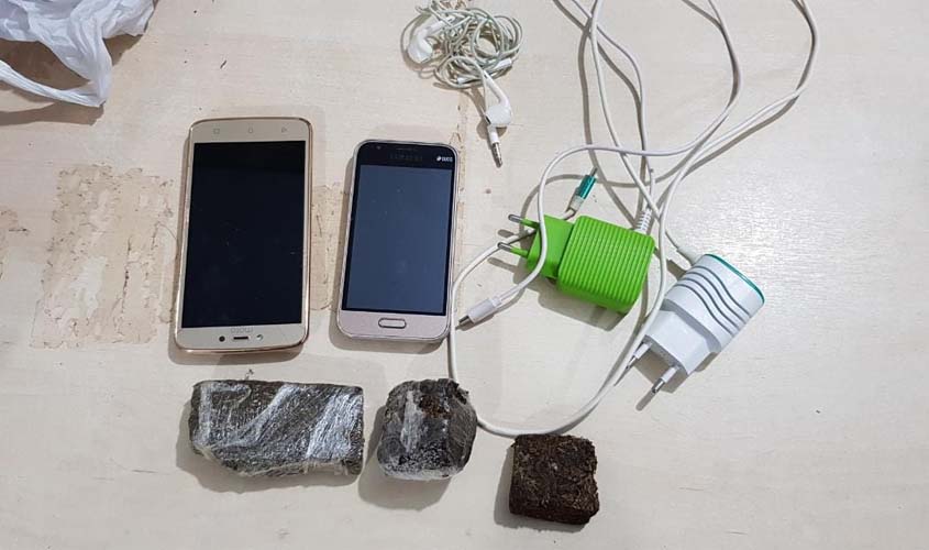Apenado do semi-aberto é preso tentando jogar droga e celulares para dentro de presídio